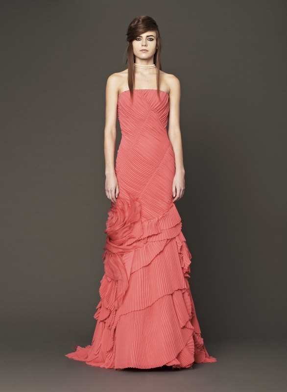 Vera Wang - Fall 2014 Bridal Collection - Wedding Dress Look 12
<br><br>
Coral strapless chiffon mermaid gown with alternating pleat bodice, organic flower detail and pleated tier skirt.

<br><br>
